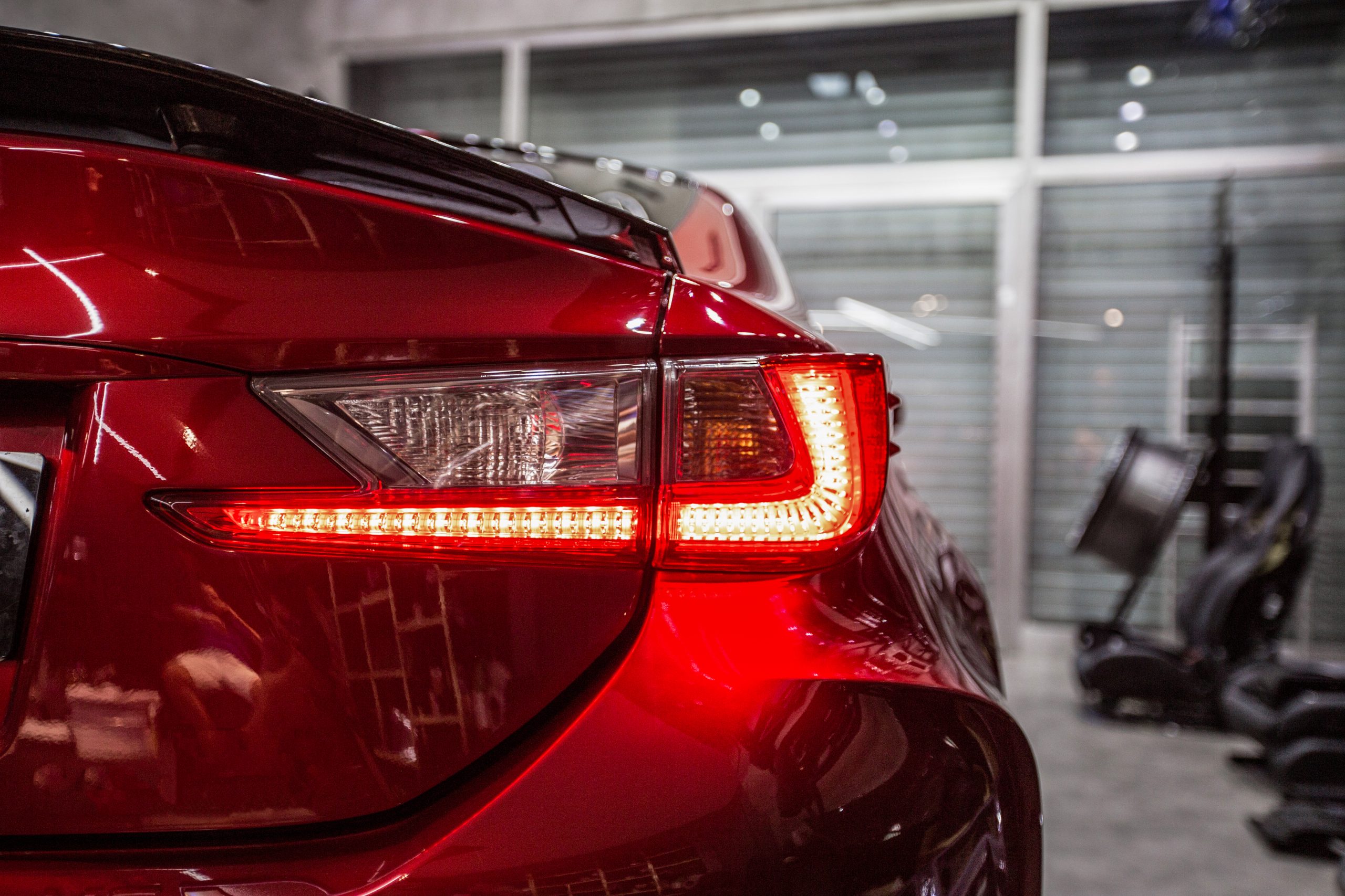 back-red-lights-red-sport-car
